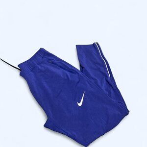 Men’s Nike joggers, blue, size Large. Well-worn, casual comfort. Price reflect